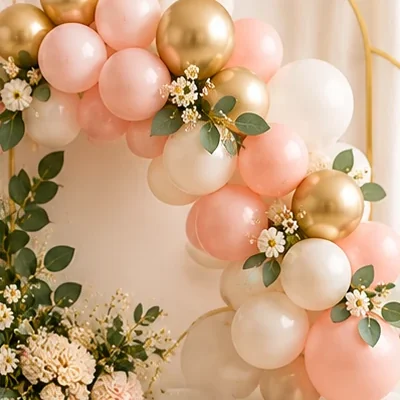 Pink, white, and gold balloon garland arch